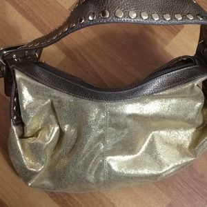 Kathy van Zeeland gold handbag purse